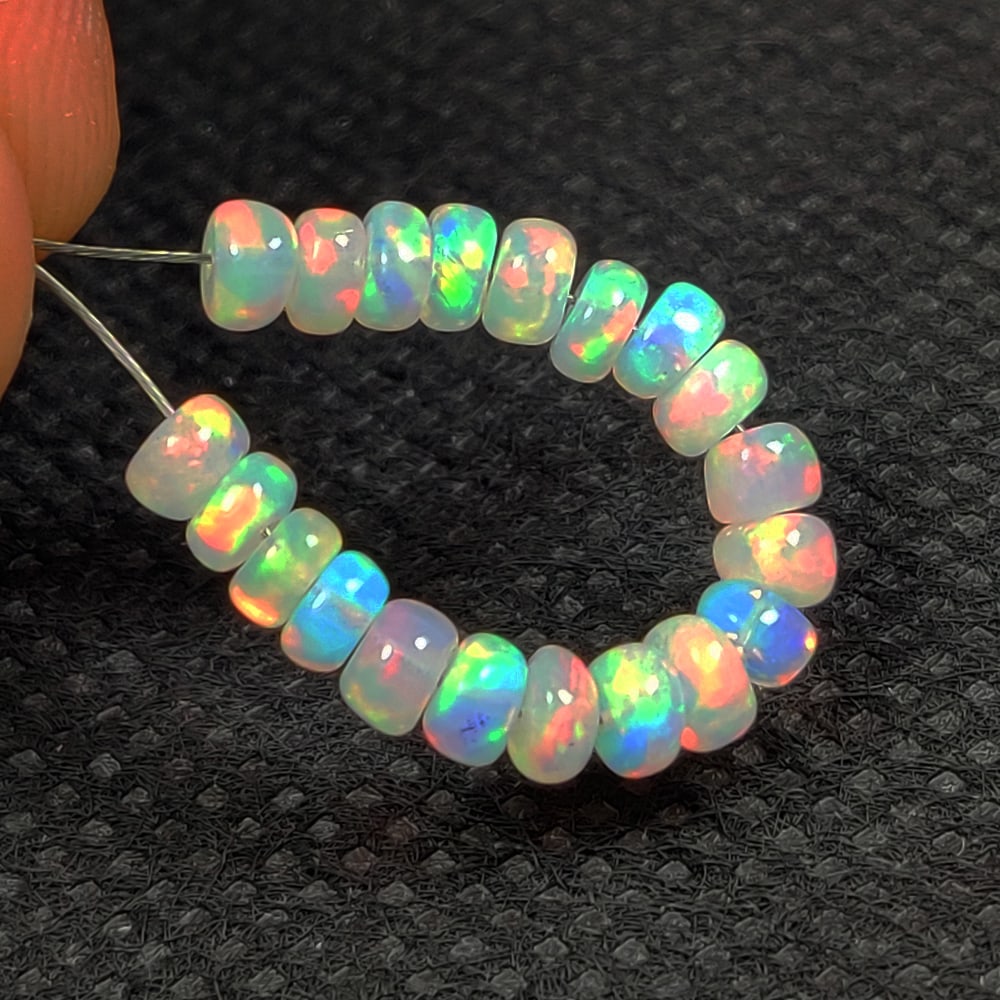 4.45 Ct Natural Multicolor Welo Opal Flash Fire Round Beads: Weight - 4.45 Ct / Dimensions - 4.10 - 4.20 mm / 20 Pc's / Shape & Cut - Drilled Round Beads / Color - Multicolor / Transparency - Translucent / Origin - Ethiopia / Comments - None