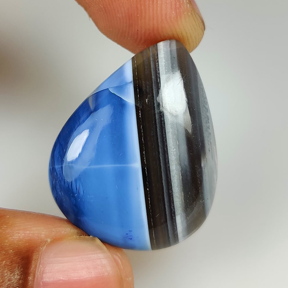 24.72 Ct Natural Blue Opal Pear Cab: weight - 24.72 Ct / Size -29.00 x 22.00 x 6.10 mm / Shape - Excellent Pear Cab / Origin - Brazil / Treatment - None