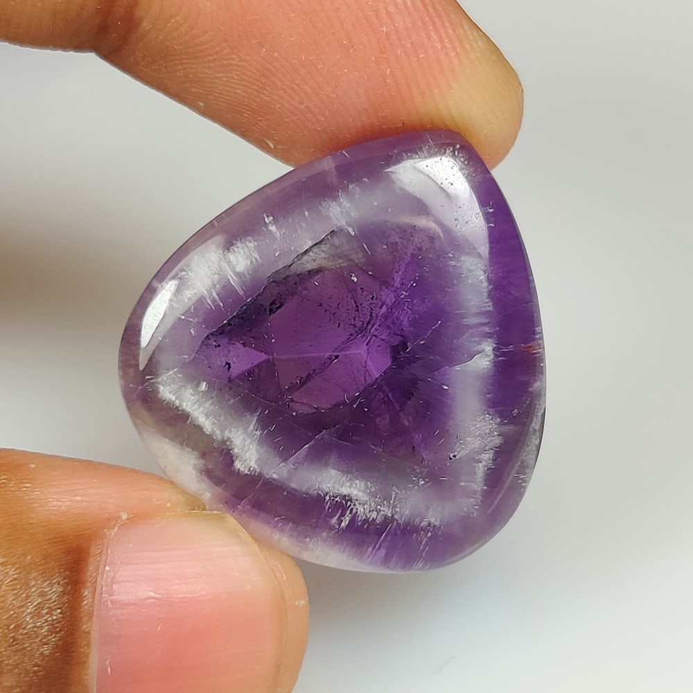 26.79 Ct Natural Chevron Amethyst Pear Cab (1 of 2)