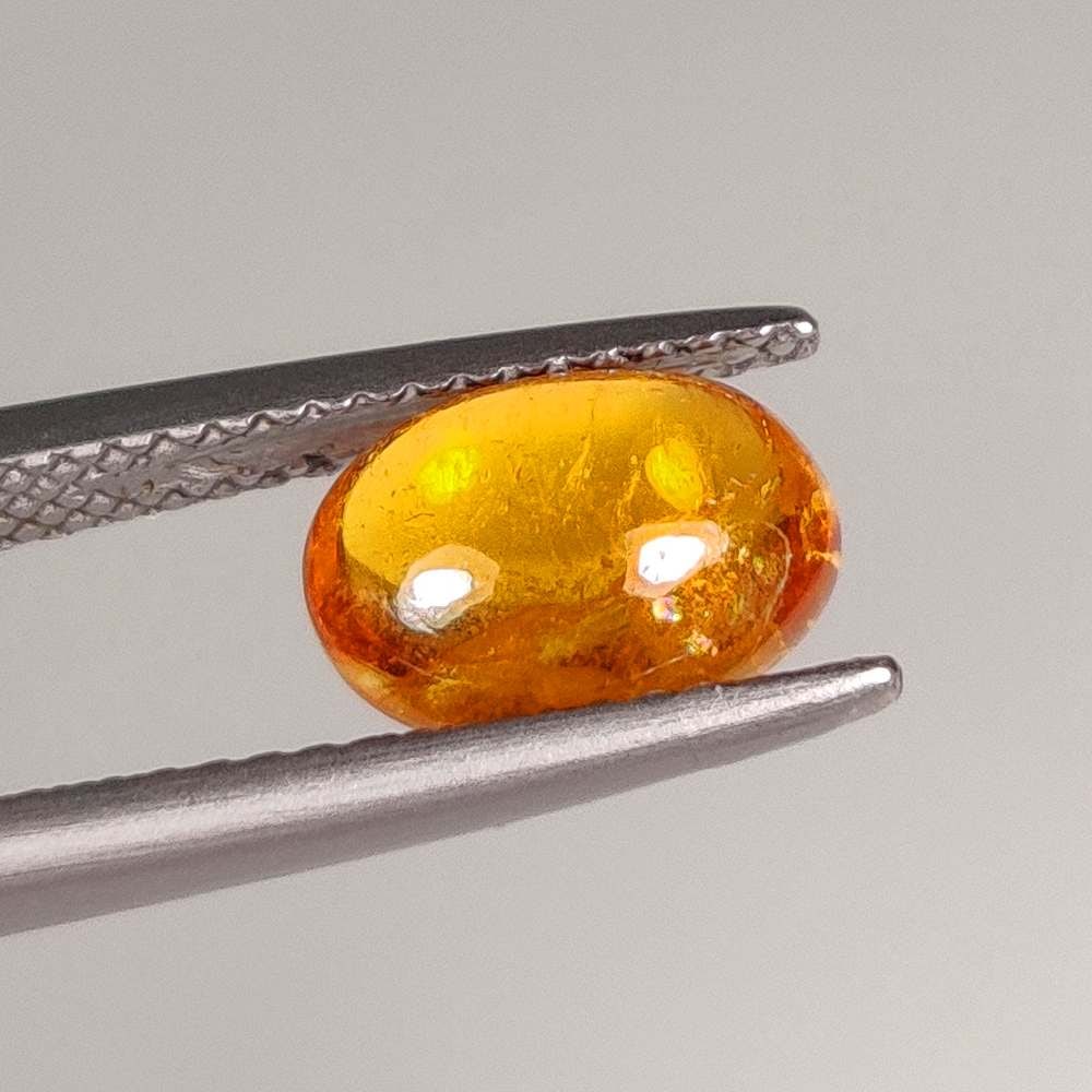 2.62 Ct Natural Deep Orange Spessarite Garnet Oval Cab: Weight - 2.62 Ct / Size - 9.10 x 6.50 x 4.00 mm / Shape - Oval Cab / Clarity - SI / Origin - Madagascar / Treatment - None