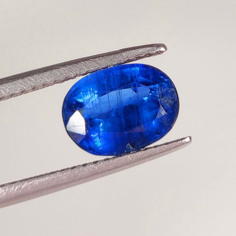 2.40 Ct Natural Blue Kyanite Oval Cut: Weight - 2.40 Ct / Size -9.00 x 6.80 x 4.50 mm / Shape - Oval Cut / Color - Deep Blue / Clarity - Transparent / Origin - India / Treatment - None