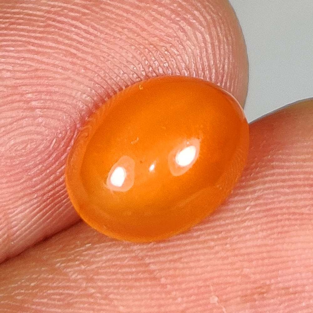2.17 Ct Natural Orange Carnelian Oval Cab: Weight - 2.17 Ct / Dimensions - 10.00 x 8.00 x 4.00 mm / Shape & Cut - Oval Cab / Transparency - Semi - Opaque / Origin - Brazil