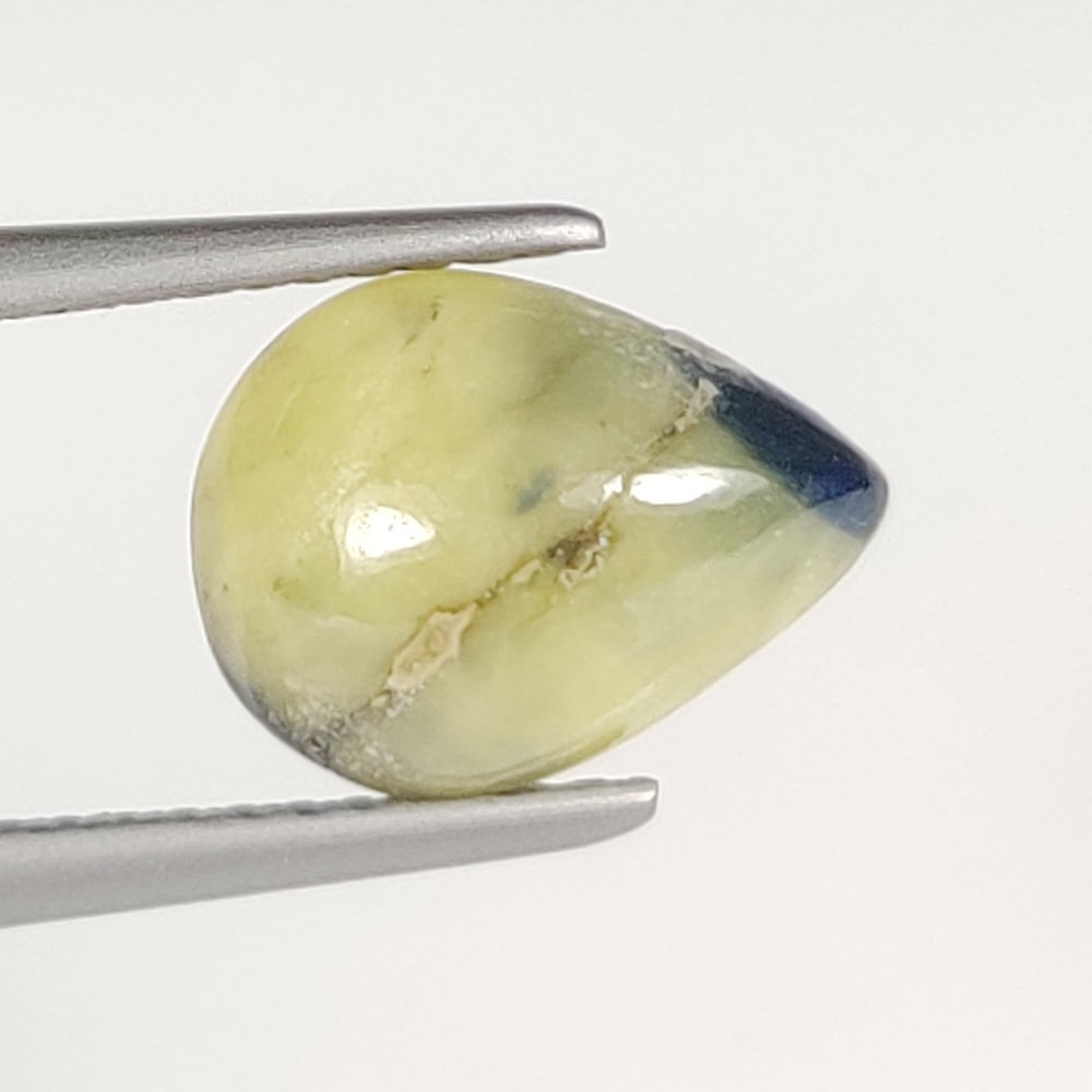 3.33 Ct Natural Unheated Bicolor Sapphire Pear Cab: Weight - 3.33 Ct / Size- 10.00 x 7.70 x 5.00 mm / Shape - Pear Cab / Clarity - Opaque / Origin - Sri Lanka / Treatment - none