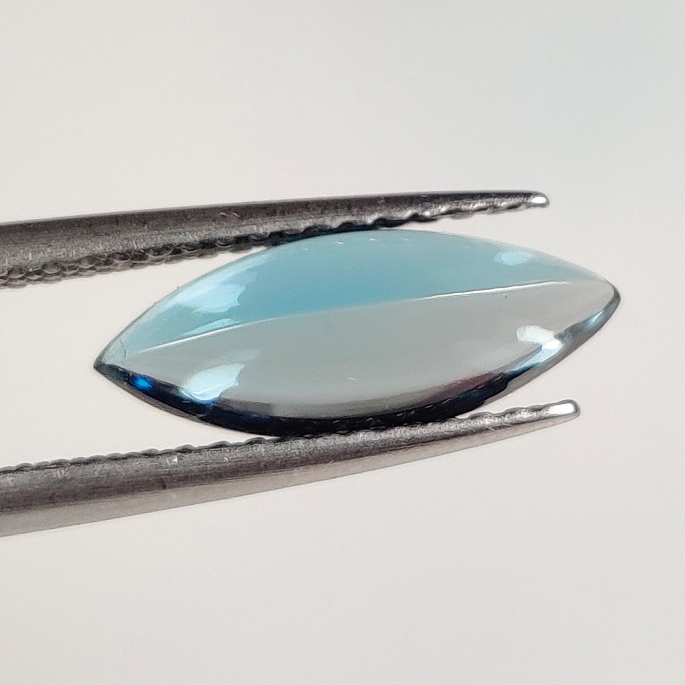 1.85 Ct Natural London Blue Topaz Marquise Cut: Weight - 1.85 Ct / Dimensions - 13.00 x 5.10 x 3.80 mm / Shape - Marquise cut / Color - Blue / Clarity - VVS / Origin - Brazil / Treatment - Irradiated