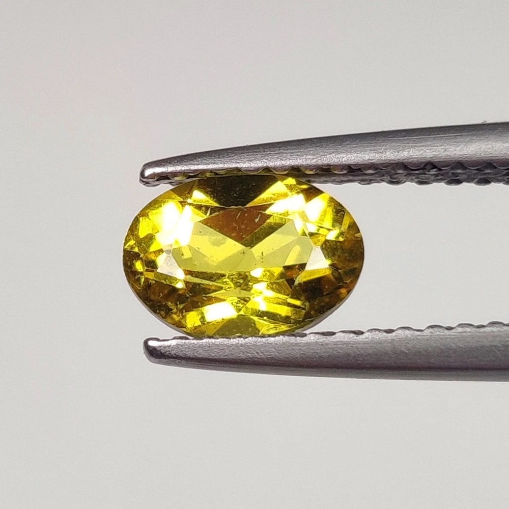 0.75 Ct Natural Yellow Beryl Oval Cut: Weight - 0.75 Ct / Dimensions - 7.00 x 5.00 x 3.80 mm / Shape - Oval Cut / Color - Yellow / Clarity - VVS / Origin - Brazil / Treatment - Heated