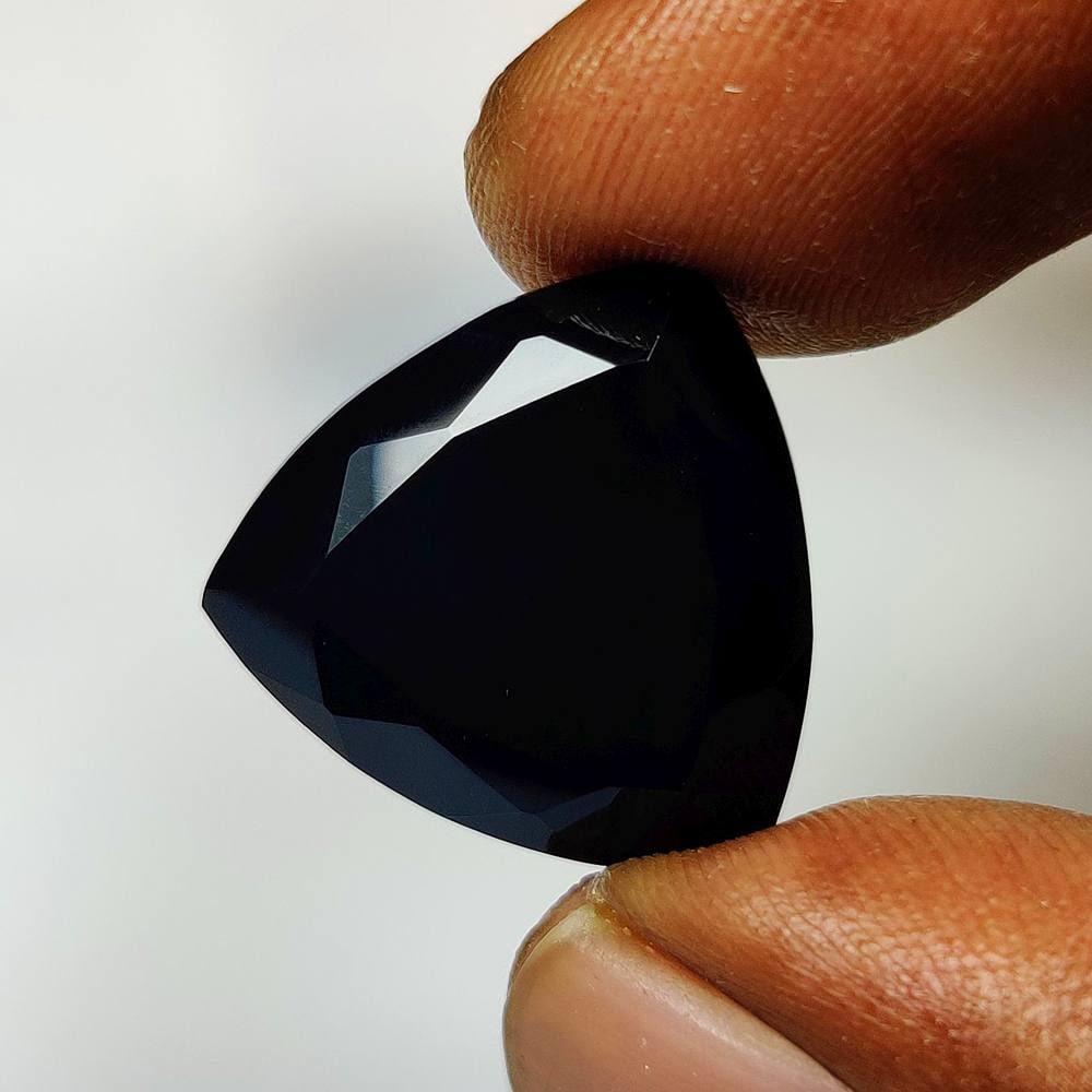 15.72 Ct Natural Black Onyx Trillion Cut: Weight - 15.72 Ct / Dimensions - 19.00 x 18.70 x 8.50 mm / Shape - Trillion Cut / Clarity - Opaque / Origin - Brazil / Treatment - None