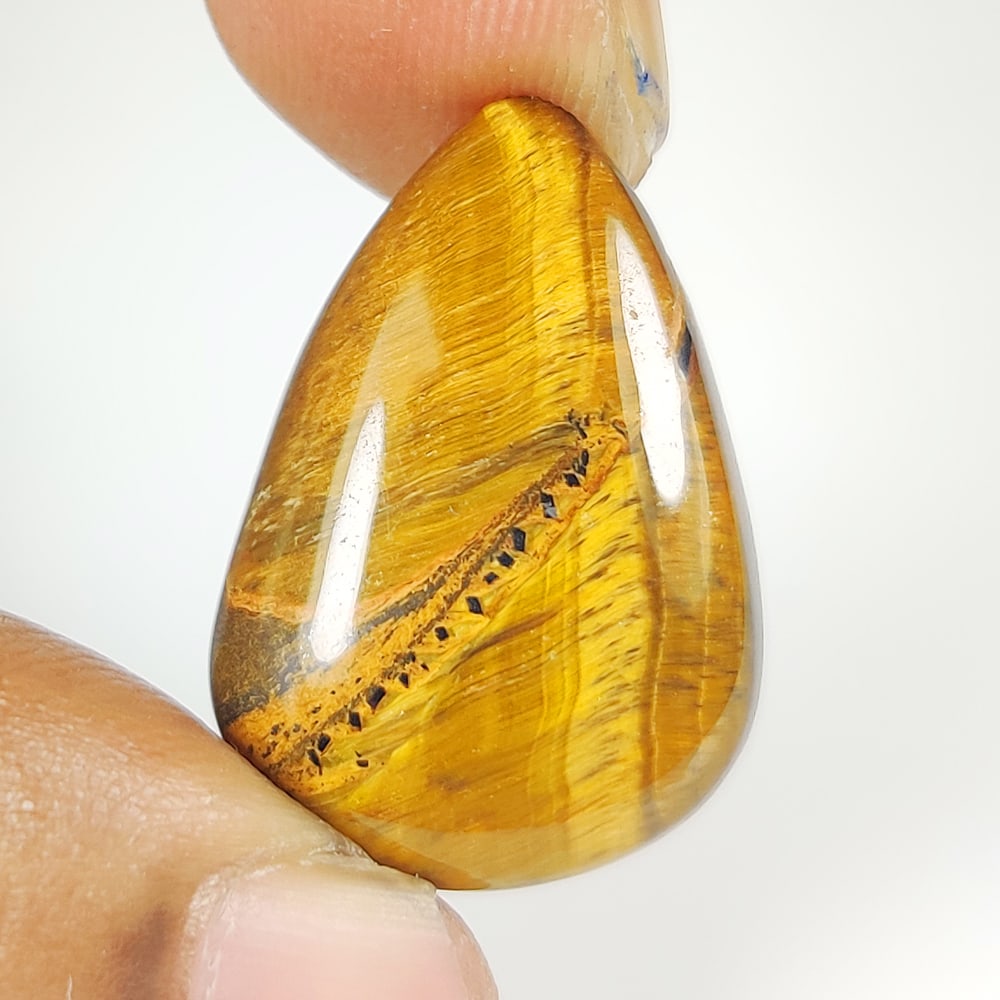 17.33 Ct Natural Tiger Eye Pear Cab (1 of 2)