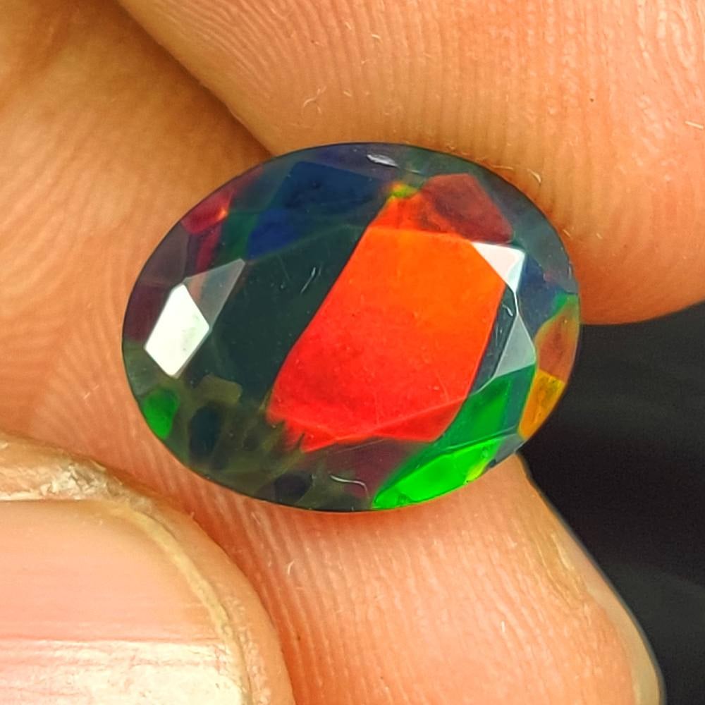 3.09 Ct Natural Black Fire Opal Oval Cut (1 of 3)