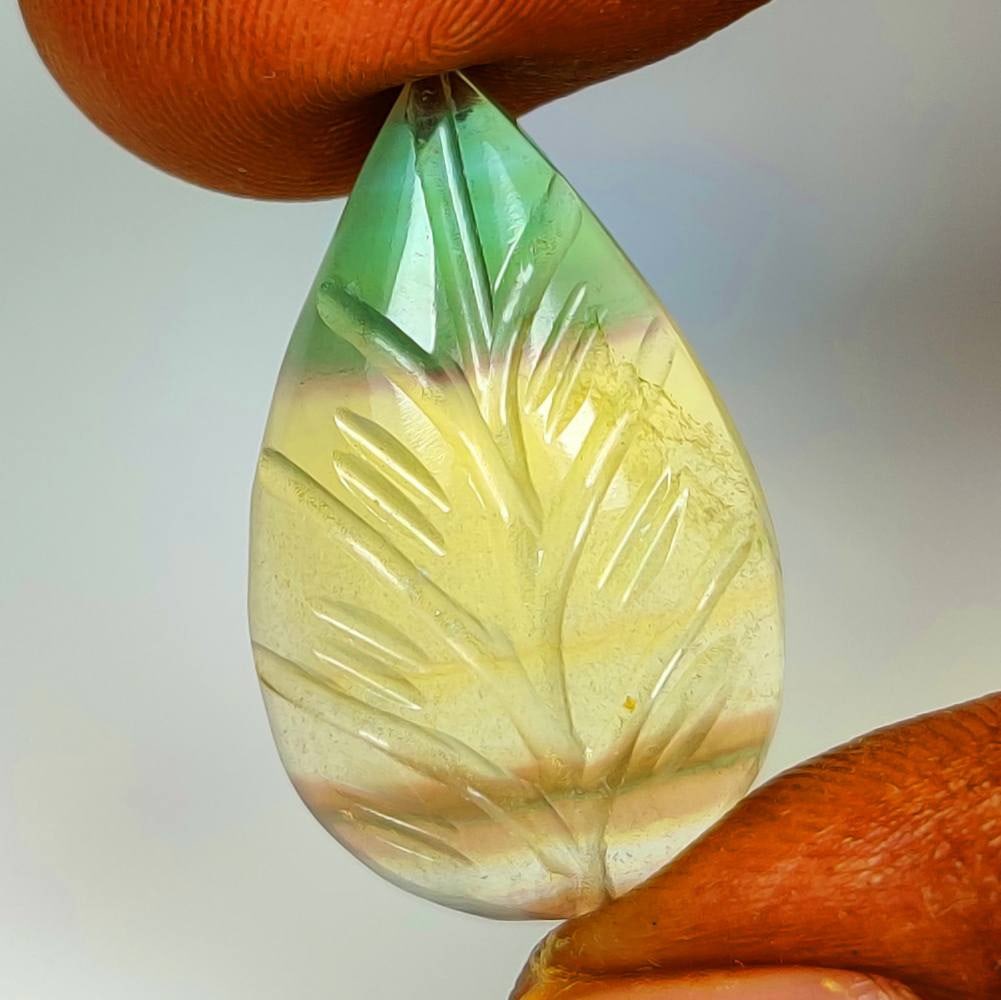 23.59 Ct Natural Flourite Pear Carving Cab (1 of 2)