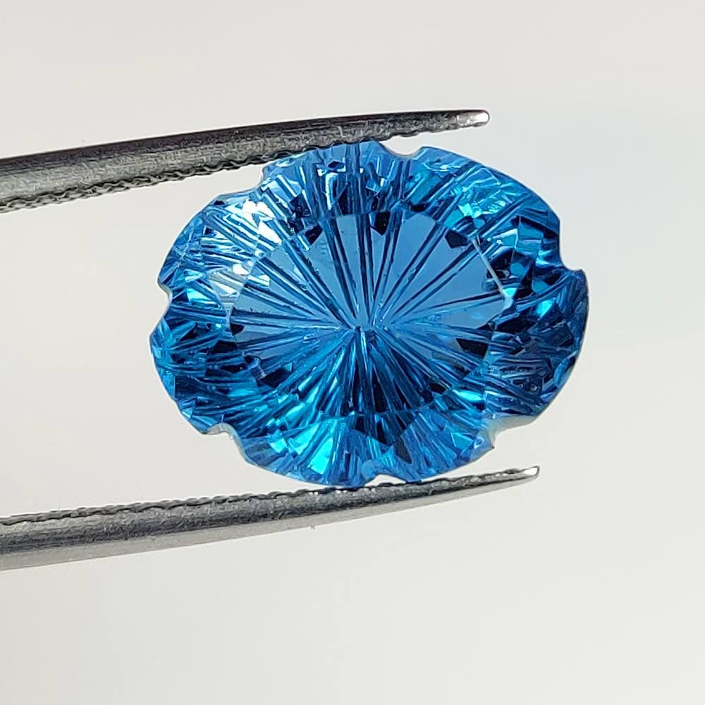 8.17 Ct Natural London Blue Topaz Oval Carving Cut (1 of 2)