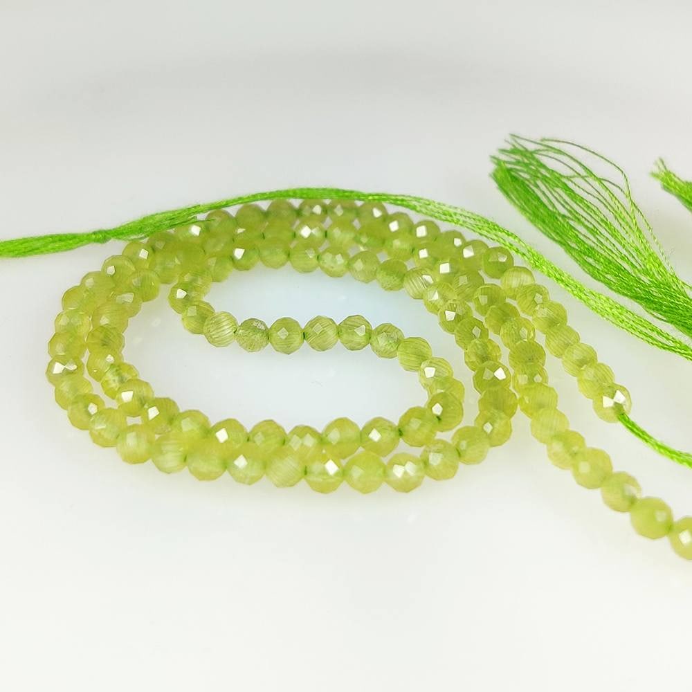 18.08 Ct Natural Green Peridot Round Cut Beads: Weight - 18.08 Ct / Dimensions - 3.00 - 3.20 mm / 109 Pc's / Shape - Round Cut Beads / Color - Green / Clarity - VVS / Origin - Pakistan / Treatment - None