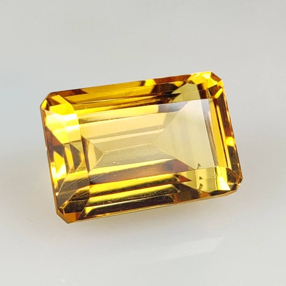 14.63 Ct Natural Yellow Citrine Octagon Cut: Weight - 14.63 Ct / Size - 16.80 x 11.10 x 9.80 mm / Shape - Octagon Cut / Color - Yellow / Clarity - VVS / Origin - Brazil / Treatment - Heated