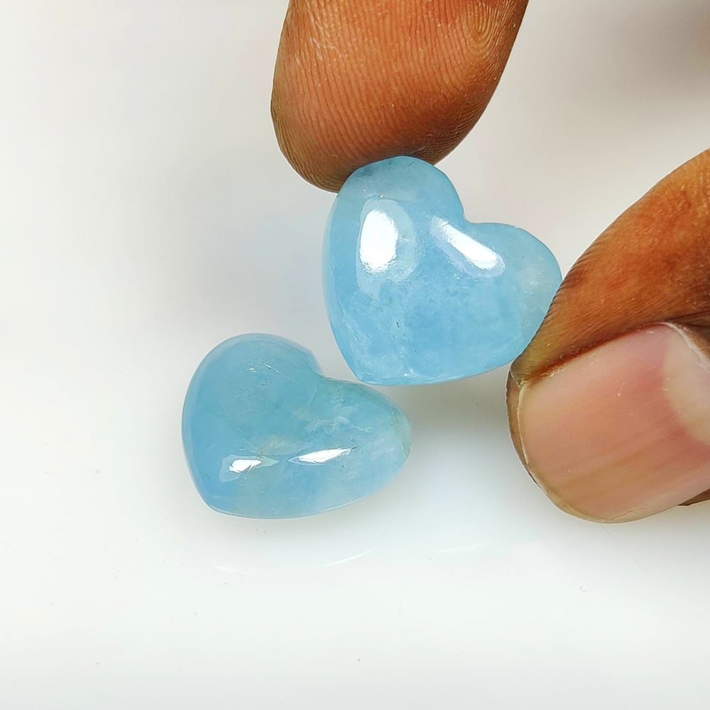 22.72 Ct Natural Aquamarine Heart Cab Pair: Weight - 22.72 Ct / Size - 14.80 x 17.00 x 6.50 mm / 2 Pc's / Shape - Heart Cab / Color - Baby Blue / Clarity - Opaque / Origin -India / Treatment - None
