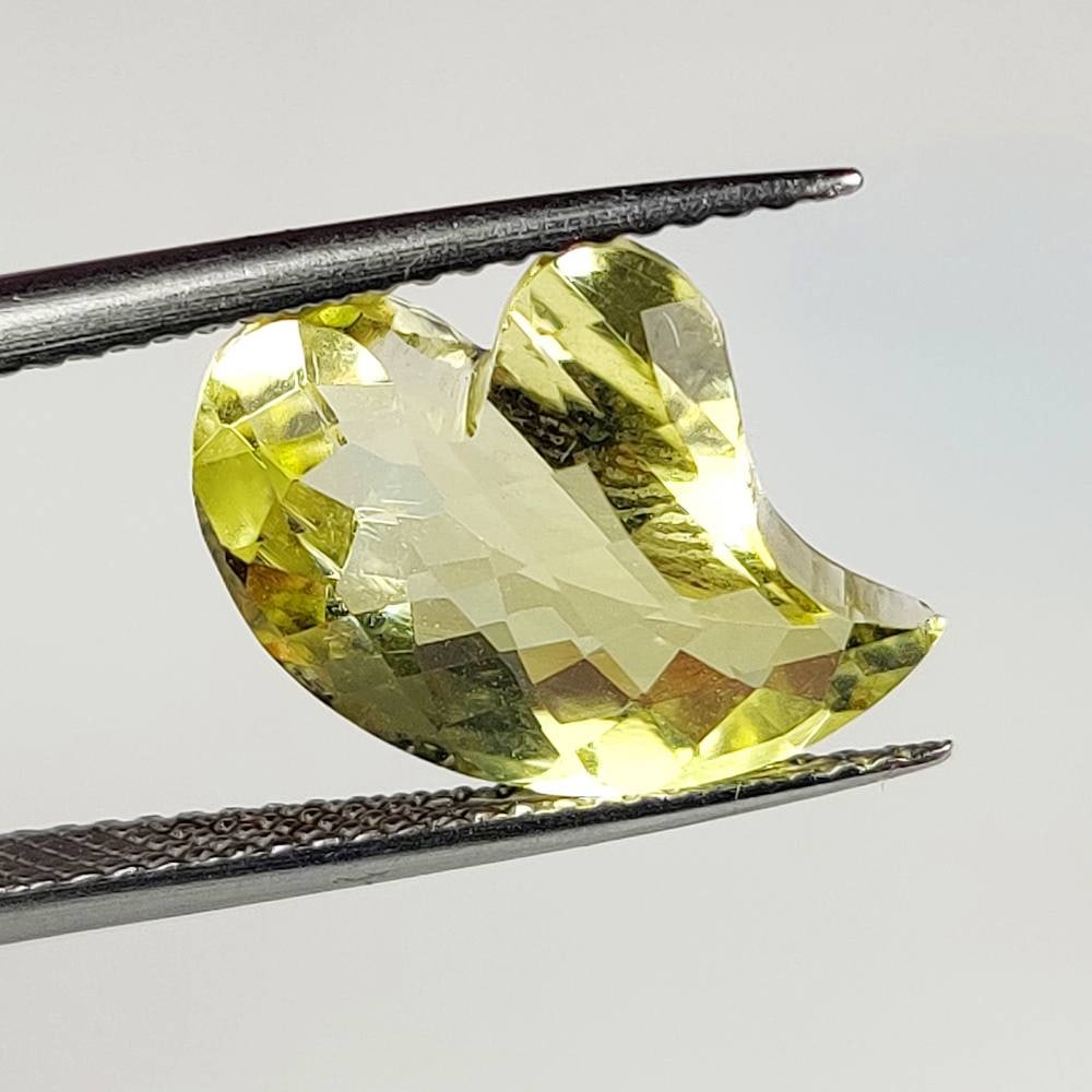 4.55 Ct Natural Lemon Quartz Fancy Cut: Weight - 4.55 Ct / Dimensions - 15.10 x 11.10 x 5.80 mm / Top Quality Luster / Excellent Fancy Cut / Origin - Brazil / Comments - Heated