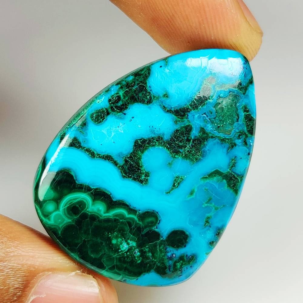 72.36 Ct Natural Azumalachite Pear Cab: weight - 72.36 Ct / Dimensions - 38.00 x 29.00 x 7.60 mm / Shape & Cut - Excellent Pear Cab / Origin - Russia / Comments - None