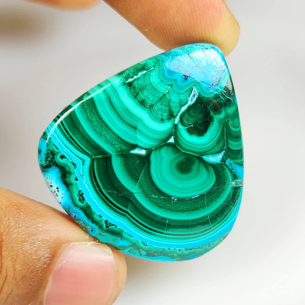 84.41 Ct Natural Azumalachite Pear Cab: weight - 84.41 Ct / Dimensions - 39.00 x 37.00 x 6.00 mm / Shape & Cut - Excellent Pear Cab / Origin - Russia / Comments - None