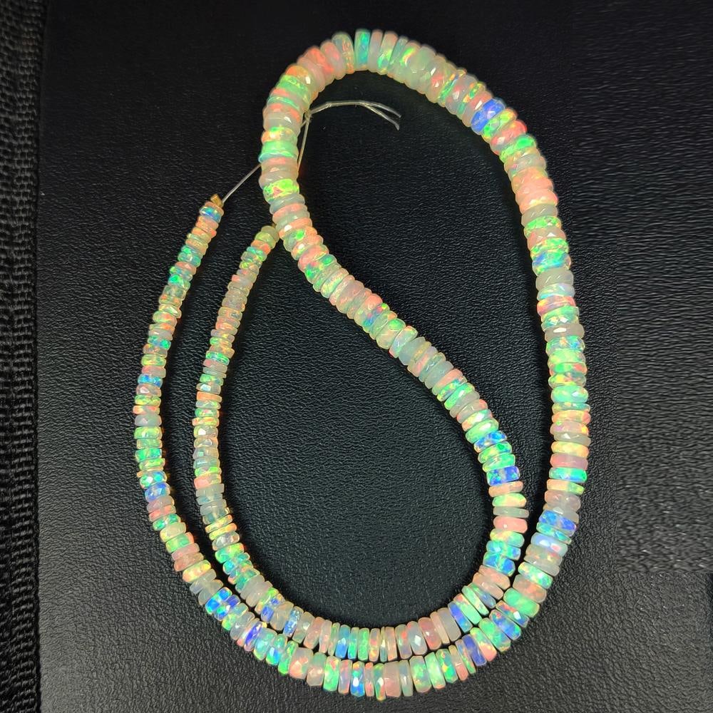 63.46 Ct Natural Multicolor Welo Opal Top Fire Round Cut Beads: Weight - 63.46 Ct / Size - 3.50 - 6.70 mm / 256 Pc's / 16.5" inches / Shape - Round Cut Beads / Color - Multicolor / Clarity - Translucent / Origin - Ethiopia / Treatment - None