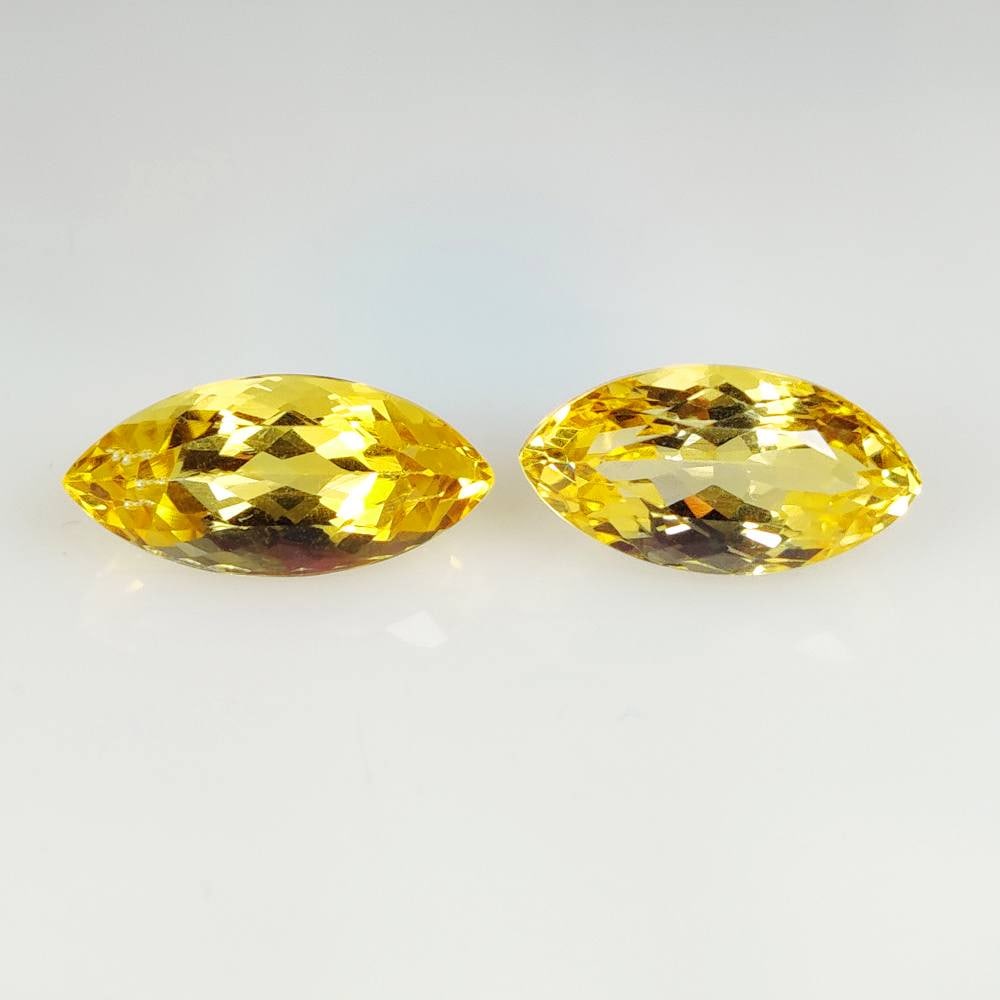 15.26 Ct Natural Yellow Citrine Marquise Cut Pair: Weight - 15.26 Ct / Dimensions - 19.00 x 9.00 x 7.60 mm / 2 Pc's / Shape - Marquise Cut / Color - Yellow / Clarity - VVS / Origin - Brazil / Treatment - Heated