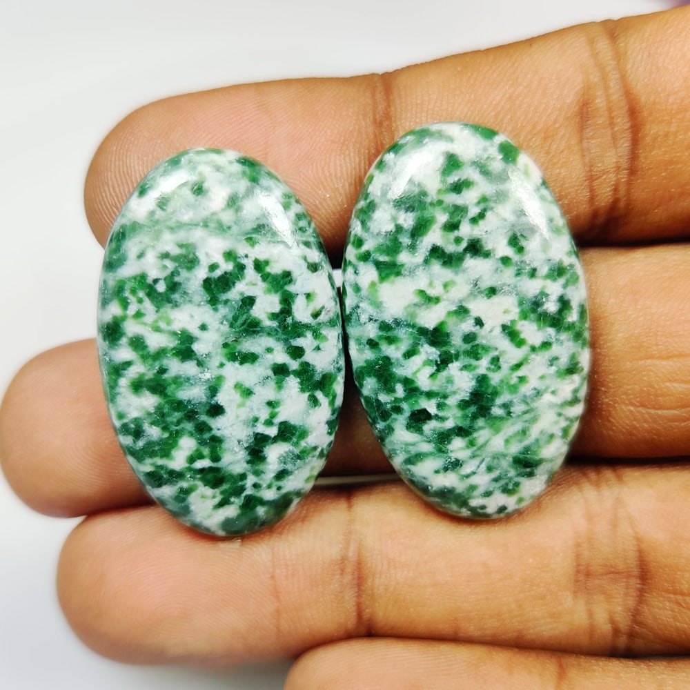 66.97 Ct Natural Diopside Oval Cab Pair: Weight - 66.97 Ct / Dimensions - 34.00 x 20.30 x 5.30 mm / 2 Pc's / Shape - Oval Cab / Color - Green / Clarity - Opaque / Origin - Brazil / Treatment - None