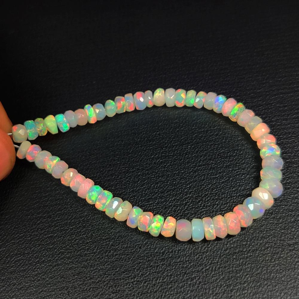 14.34 Ct Natural Multicolor Welo Opal Round Beads: Weight - 14.34 Ct / Size - 4.30 - 4.90 mm / 55 Pc's / 5.5" inches / Shape - Round Beads / Color - Multicolor / Clarity - Translucent / Origin - Ethiopia / Treatment - None