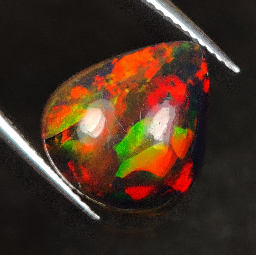 3.61 Ct Natural Black Flashing Fire "Night Blaze" Opal Pear Cab (1 of 2)