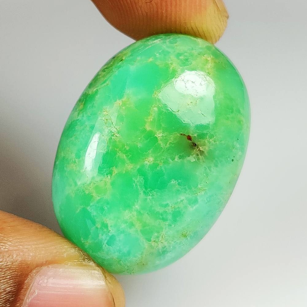 54.51 Ct Natural Green Chrysoprase OVal Cab: Weight - 54.51 Ct / Size - 30.00 x 22.00 x 11.40 mm / Shape - Oval Cab / Clarity - Opaque / Origin - Brazil / Treatment - None