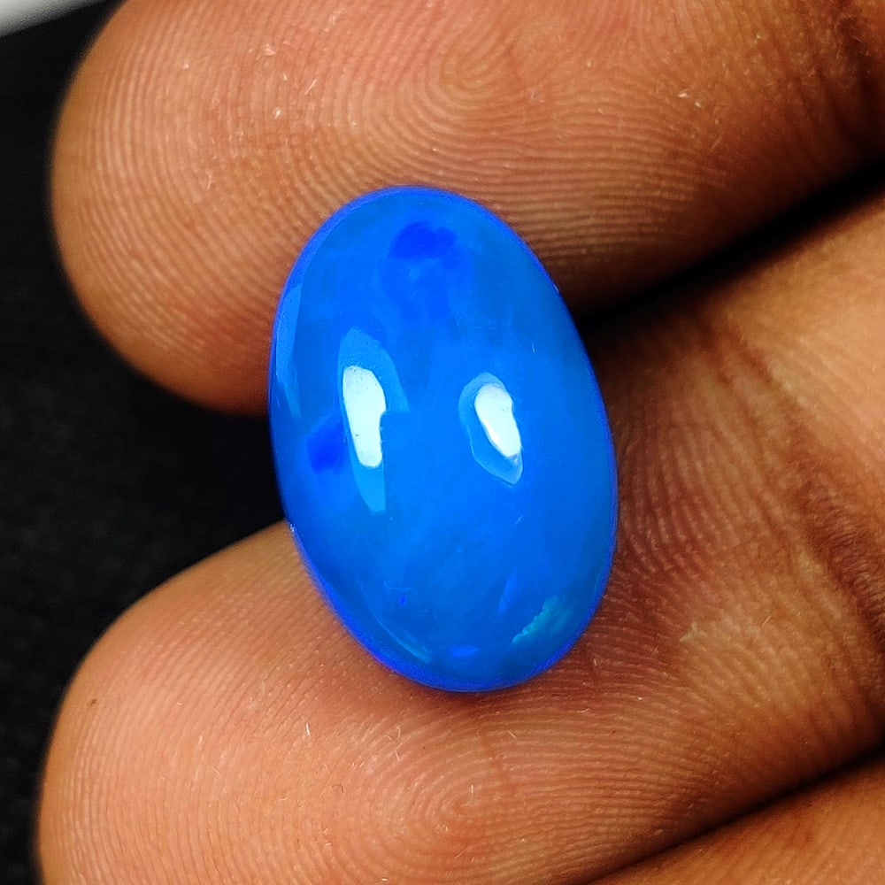 5.35 Ct Natural Blue Fire Opal Oval Cab (1 of 2)