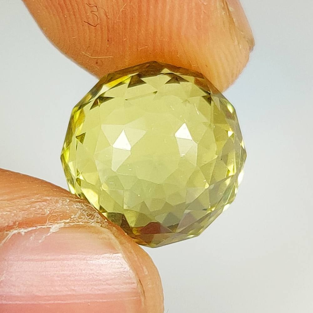 12.59 Ct Natural Lemon Quartz Round Ball: Weight - 12.59 Ct / Dimensions - 12.40 x 12.10 mm / Top Quality Luster / Excellent Round ball / Origin - Brazil / Comments - Heated