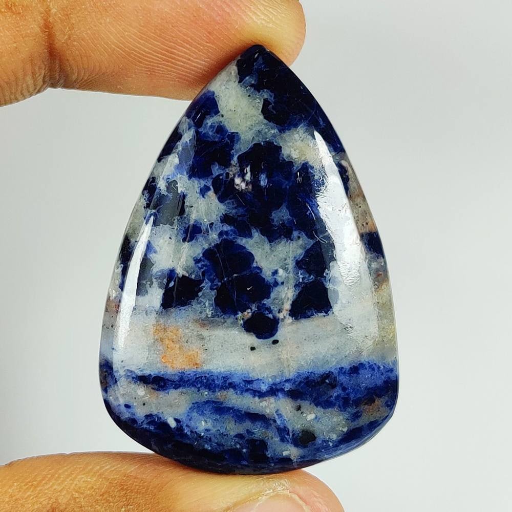 66.45 Ct Natural Blue Sodalite Pear Cab: Weight - 66.45 Ct / Size - 42.00 x 30.00 x 7.30 mm / Shape - Pear Cab / Clarity - Opaque / Origin - Russia / Treatment - None