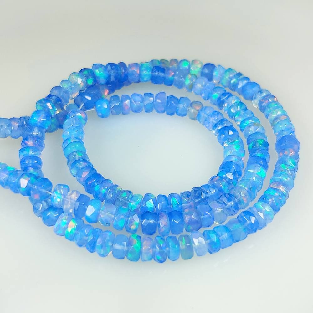 46.44 Ct Natural Blue Fire Opal Round Cut Beads: Weight - 46.44 Ct / Size - 4.40 - 5.00 mm / 163 Pc's / Shape - Round Cut beads / Transparency - Transparent / Origin - Ethiopia / Treatment - Heated