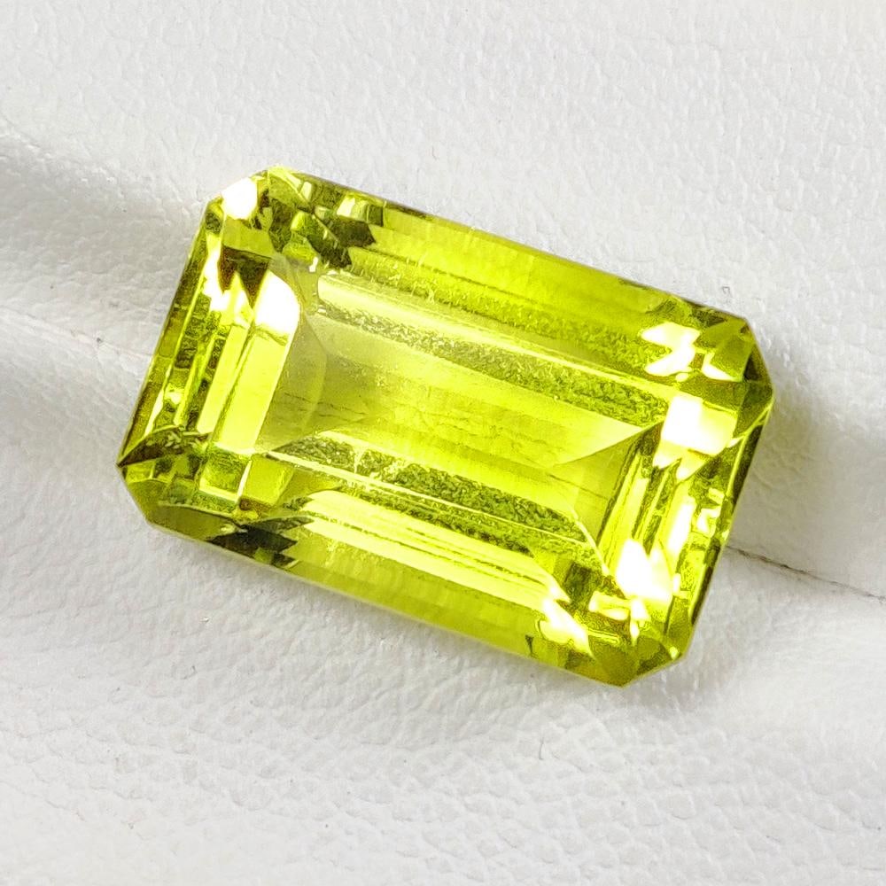 12.87 Ct Natural Lemon Quartz Octagon Cut: Weight - 12.87 Ct / Dimensions - 16.70 x 10.80 x 9.50 mm / Shape - Octagon Cut / Clarity - VVS / Origin - Brazil / Treatment - Heated