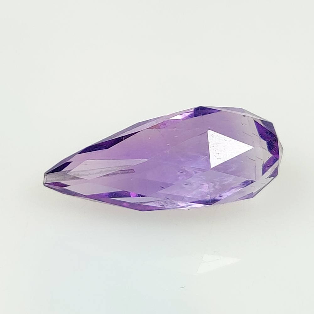 10.37 Ct Natural Purple Amethyst Pear Drop: Weight - 10.37 Ct / Dimensions - 22.00 x 8.90 x 8.90 mm / Shape - Pear Drop / Color - Purple / Clarity - VVS / Origin -Brazil / Treatment - Heated