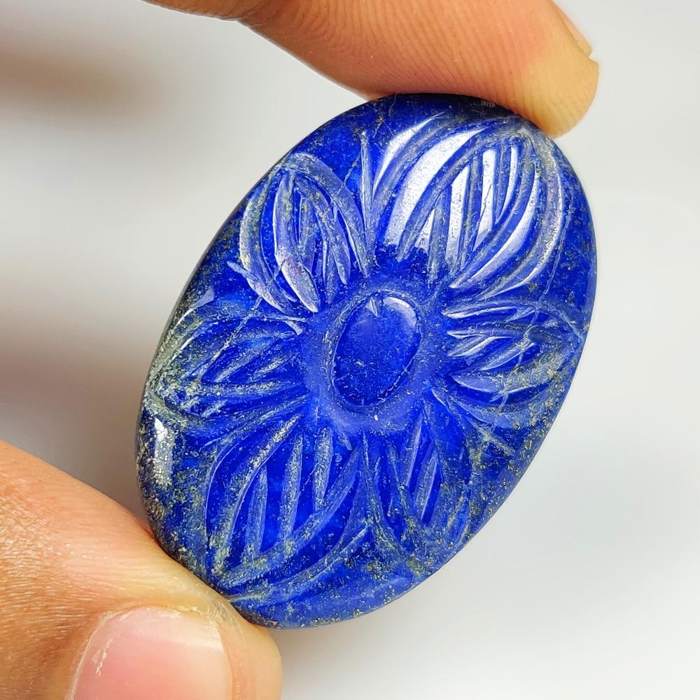 52.90 Ct Natural Blue Lapis Lazuli OVal Cab: Weight - 52.90 Ct / Size - 40.50 x 28.00 x 6.00 mm / Shape - OVal Cab / Clarity - Opaque / Origin - Afghanisthan / Treatment - None