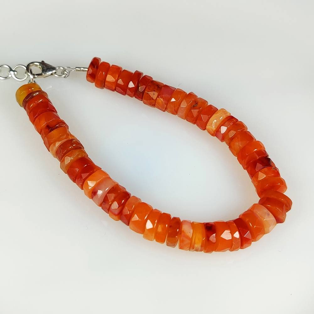66.45 Ct Natural Orange Carnelian 6.7" Round Beads Bracelet: Weight - 66.45 Ct / Dimensions - 6.50 - 7.20 mm / 52 Pc's / 6.75" inches / Top Class Quality / Round Drilled / Transparency - Semi-Transparent / Origin - Brazil / Comments - None