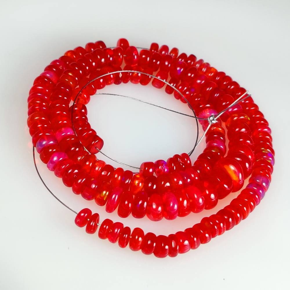 65.38 Ct Natural Orange Fire Opal Round Beads: Weight - 65.38 Ct / Size - 4.50 - 8.70 mm / 156 Pc's / Shape - Round beads / Color - Orange / Clarity - Translucent / Origin - Ethiopia / Treatment - Color Heated