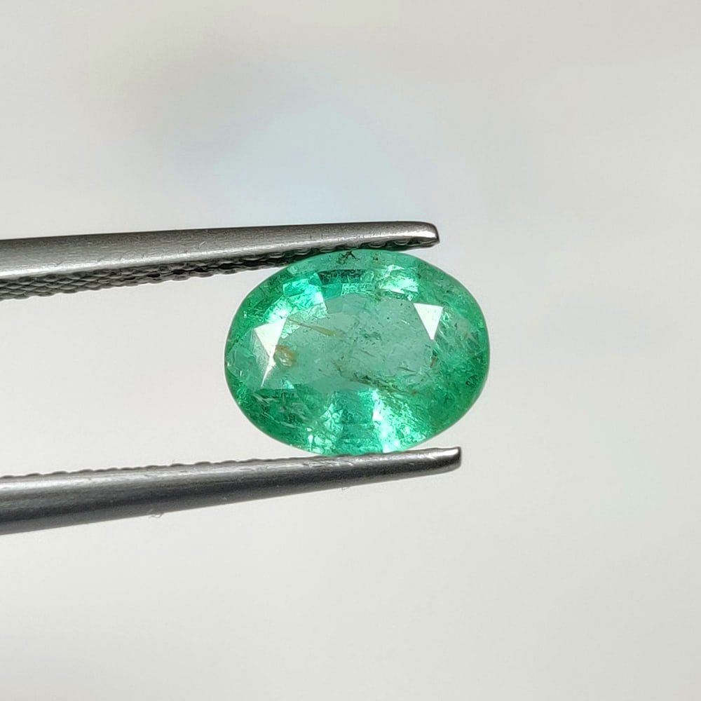 2.02 Ct Natural Zambian Emerald Oval Cut: Weight - 2.02 Ct / Dimensions - 9.00 x 7.10 x 4.80 mm / Shape - Oval Cut / Color - Green / Clarity -SI / Origin - Zambia / Treatment - Natural Emeralds are commonly enhanced by oil