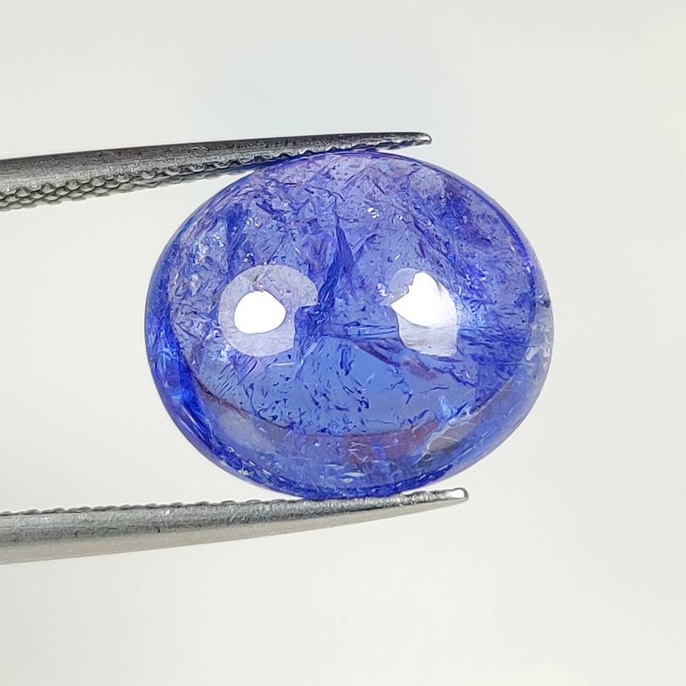 9.51 Ct Natural Tanzanite Oval Cab (1 of 2)
