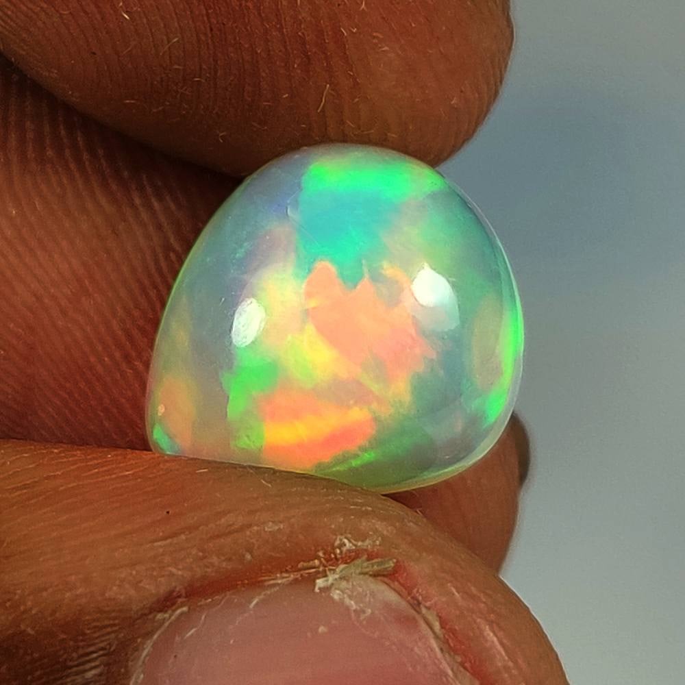 3.96 Ct Natural Multicolor Welo Opal Top Fire Pear Cab (1 of 3)