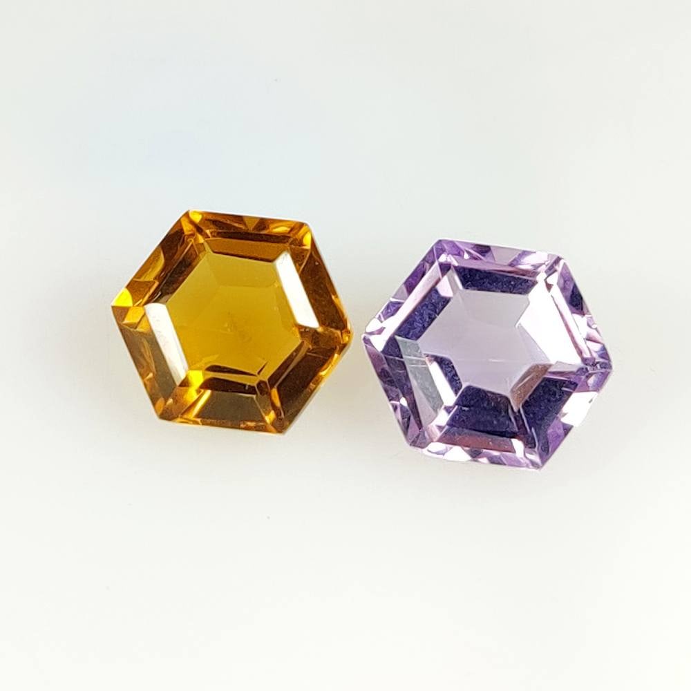 8.62 Ct Natural Citrine & Purple Amethyst Hexagon Cut Pair: Weight - 8.62 Ct / Dimensions - 11.70 x 10.00 x 6.40 mm / 2 Pc's / Shape - Hexagon Cut / Color - Yellow & Purple / Clarity - VVS / Origin -Brazil / Treatment - Heated