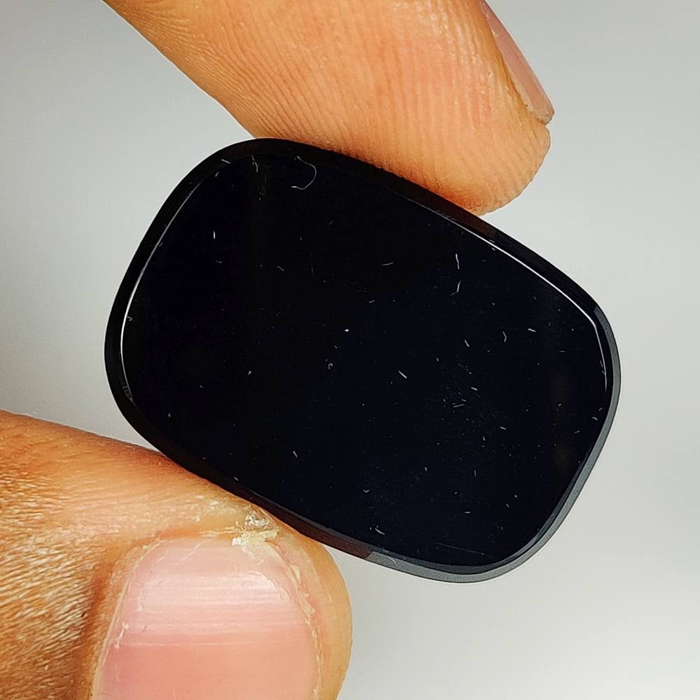 12.18 Ct Natural Black Onyx Cushion Cab: Weight - 12.18 Ct / Size - 27.00 x 17.90 x 2.60 mm / Shape - Cushion Cab / Color - Black / Clarity - OPaque / Origin - Brazil / Treatment - None