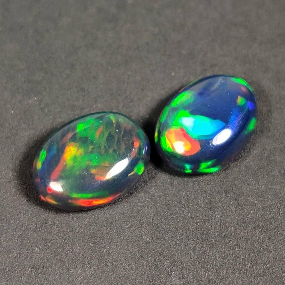 4.42 Ct Natural Black Flashing Fire Opal Oval Cab Pair (1 of 2)