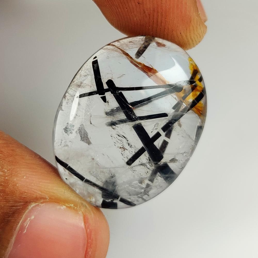 24.92 Ct Natural Rutile Quartz Oval Cab: Weight - 24.92 Ct / Dimensions - 28.00 x 20.50 x 5.80 mm / Shape & Cut - Oval Cab / Transparency - Transaprent / Origin - Norway / Comments - None