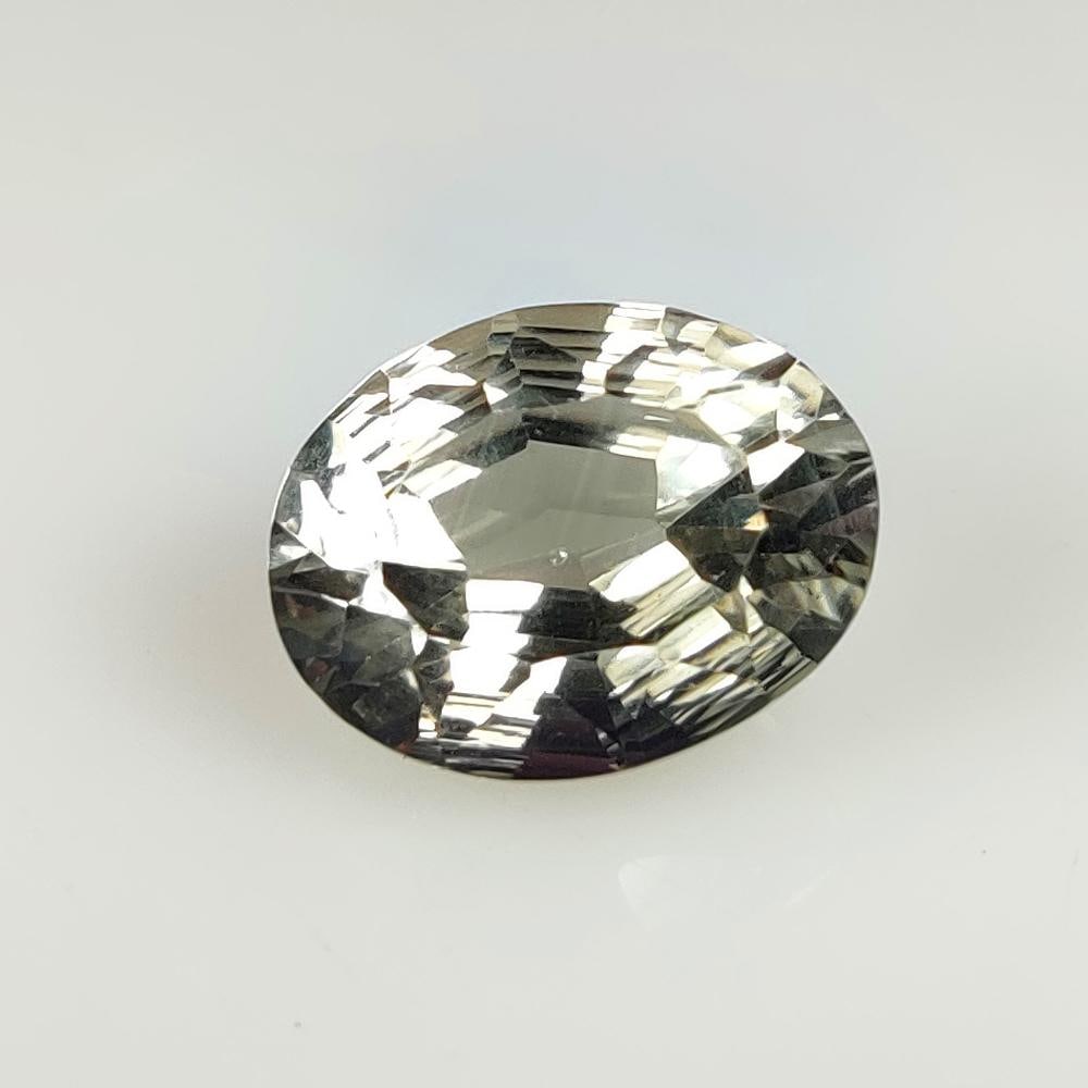 9.25 Ct Natural Green Amethyst OVal Cut: Weight - 9.25 Ct / Size - 15.30 x 11.70 x 9.00 mm / Shape - Oval Cut / Color - Green / Clarity - VVS / Origin - Brazil / Treatment - Heated