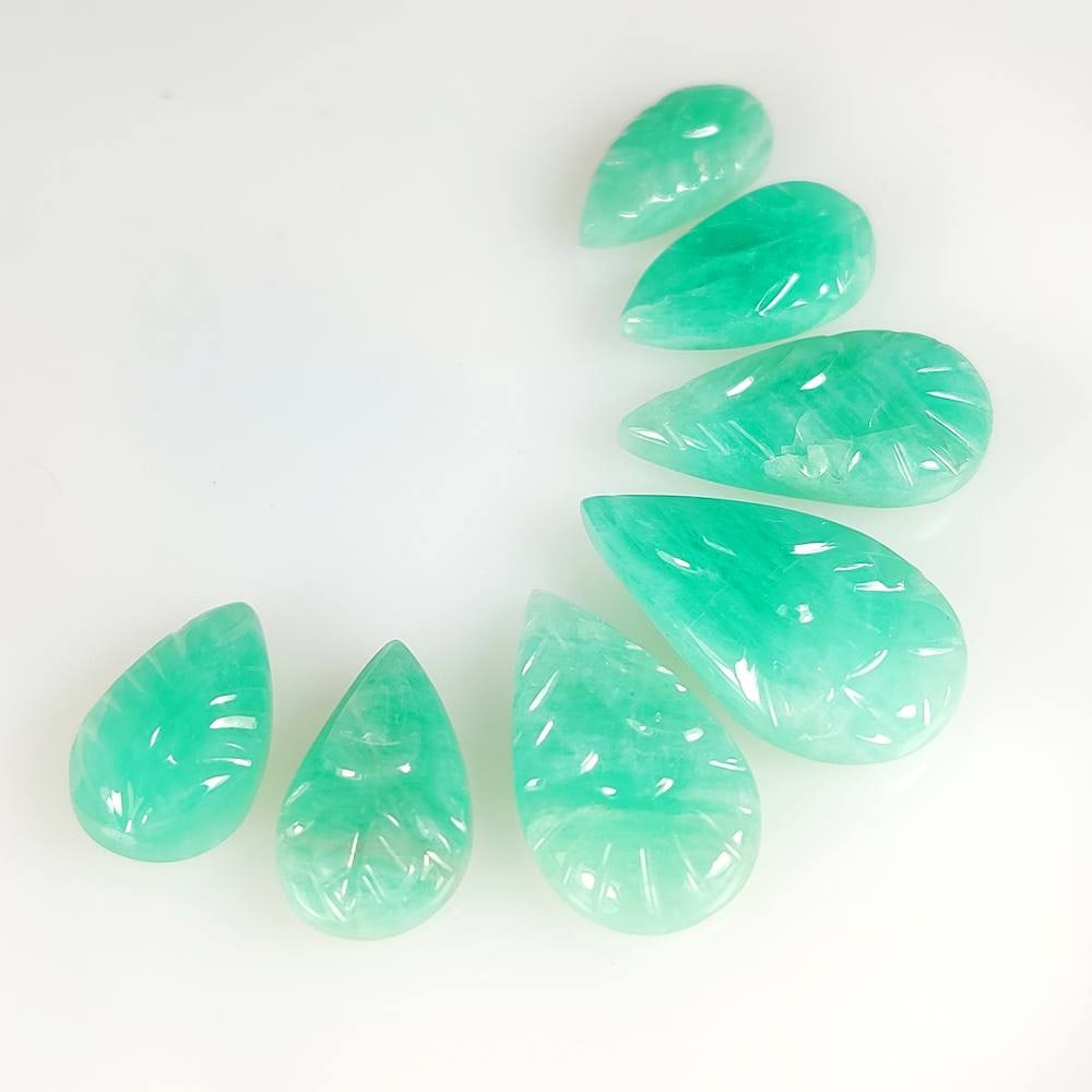34.76 Ct Natural Green Emerald Pear Carving Cab Set (1 of 2)