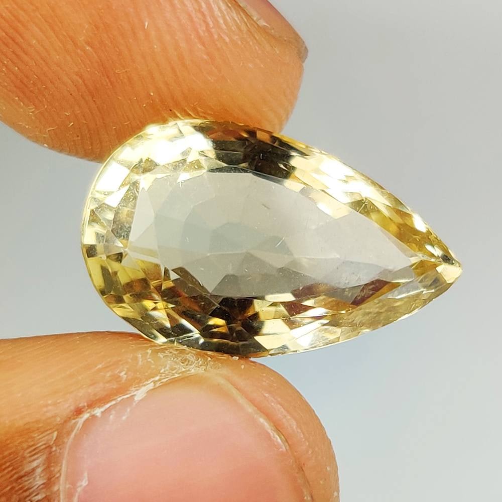 11.74 Ct Natural Yellow Citrine Pear Cut: Weight - 11.74 Ct / Dimensions - 18.90 x 11.70 x 8.90 mm / Shape & Cut - Pear Cut / Color - Yellow / Transparency - VVS / Origin - Brazil / Comments - Heated