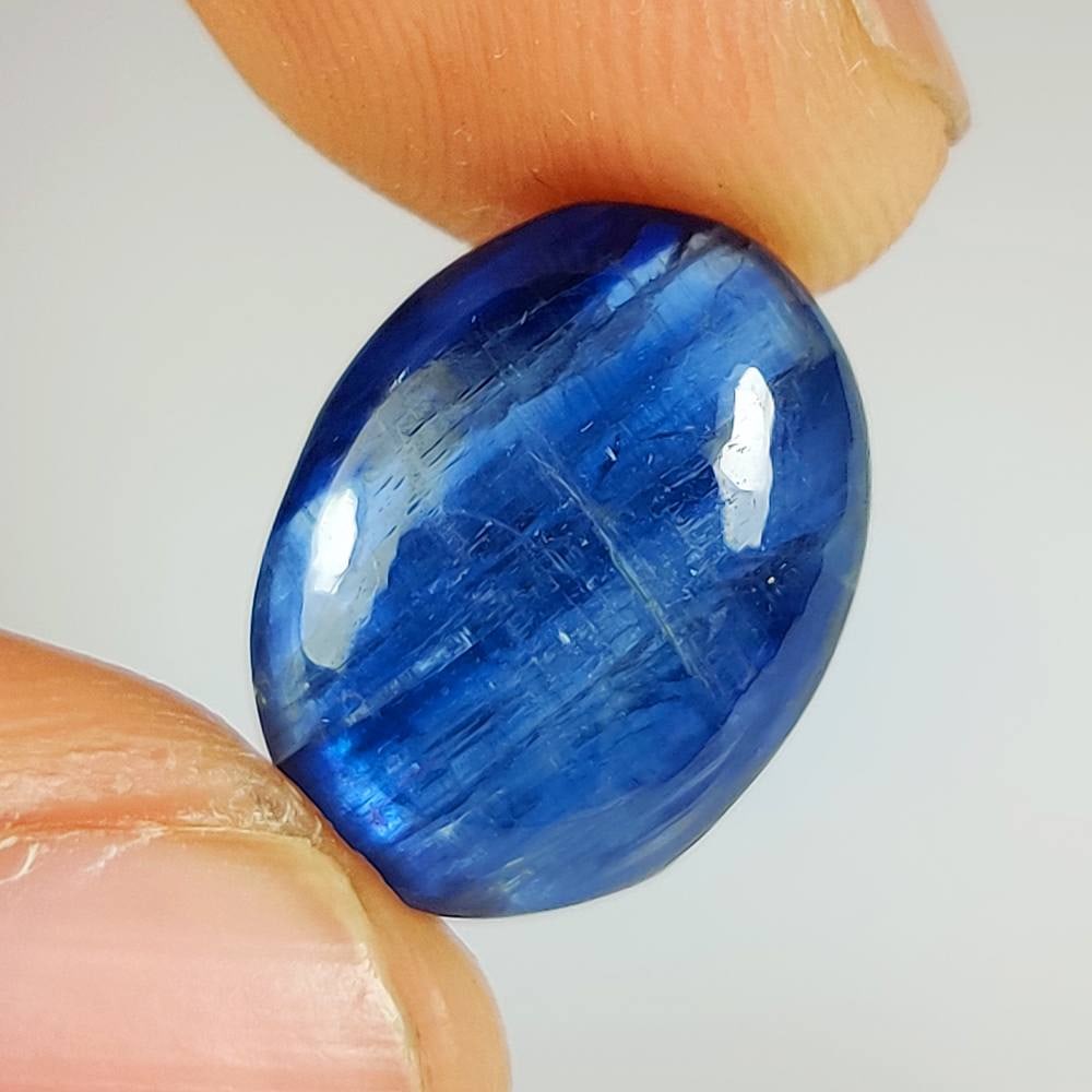 10.09 Ct Natural Blue Sapphire Oval Cab: Weight - 10.09 Ct / Dimensions - 15.70 x 11.90 x 5.10 mm / Shape - Oval Cab / Clarity - Opaque / Origin - Sri Lanka / Treatment - Diffused