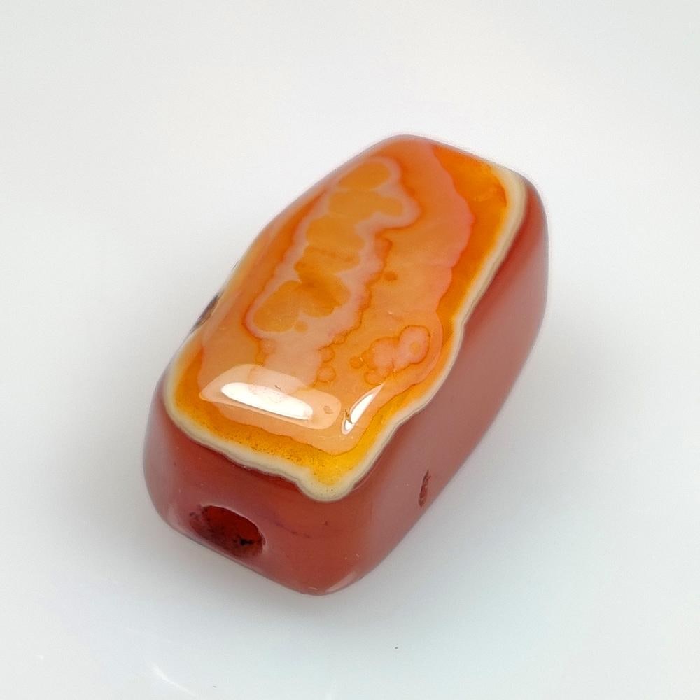 29.74 Ct Natural Orange Carnelian Drilled Dumble Cab: Weight - 29.74 Ct / Dimensions - 22.00 x 12.60 x 12.30 mm / Shape - Drilled Dumble Cab / Clarity - Semi - Opaque / Origin - Brazil