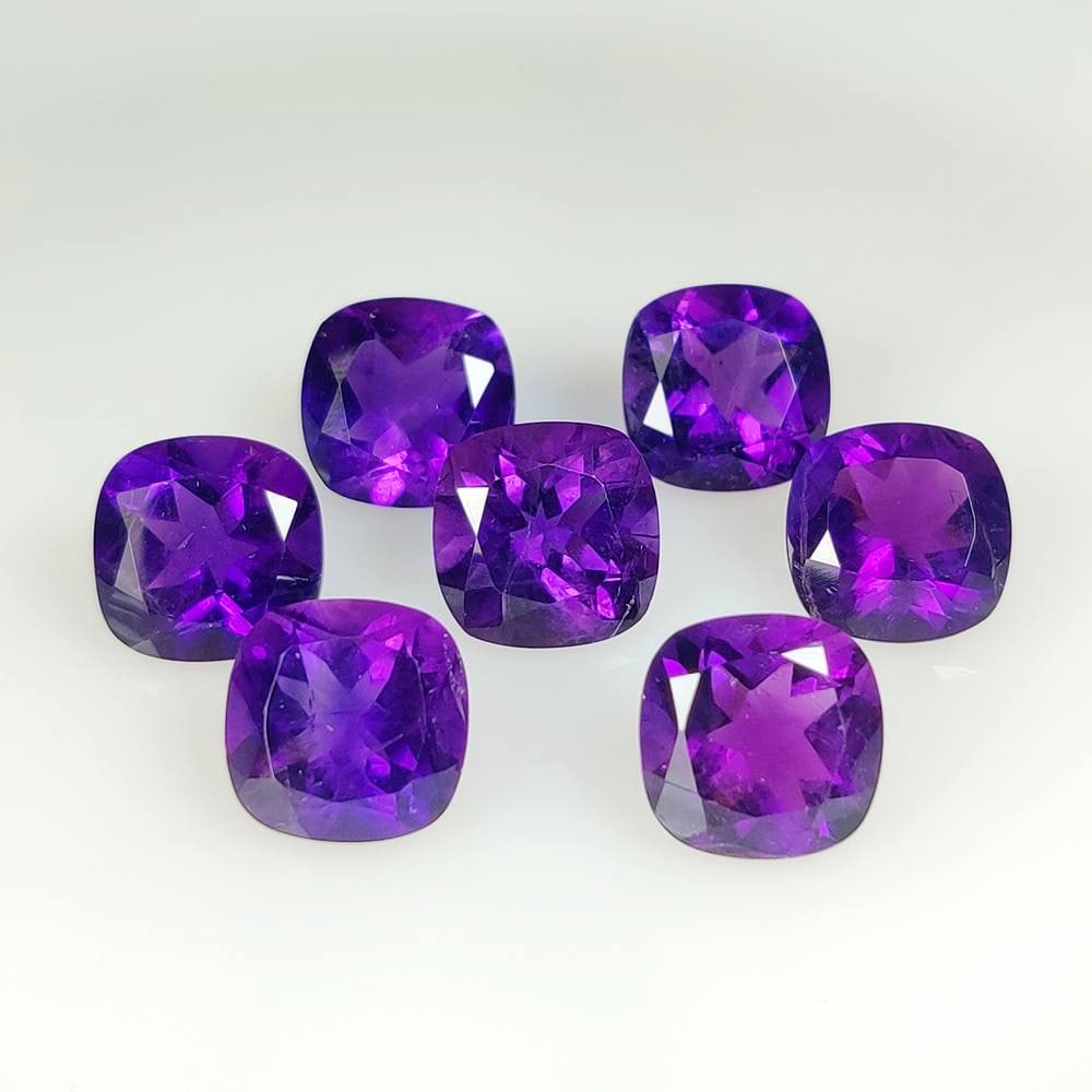 45.79 Ct Natural Purple Amethyst Cushion Cut Set: Weight - 45.79 Ct / Dimensions -12.0x7.3 - 12.3x8.3 mm / 7 Pc's / Shape - Cushion Cut / Color - Purple / Clarity - VVS / Origin -Brazil / Treatment - Heated