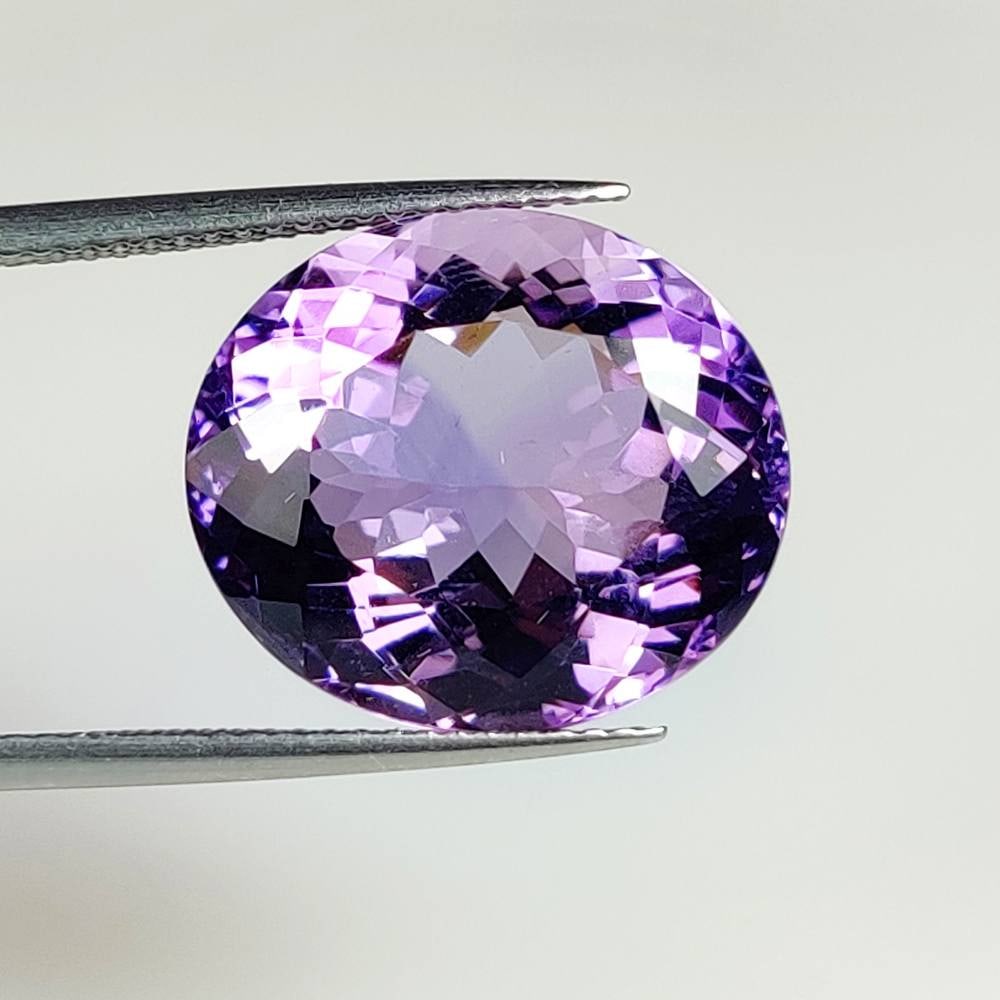 13.13 Ct Natural Purple Amethyst Oval Cut: Weight - 13.13 Ct / Dimensions - 17.00 x 14.80 x 9.50 mm / Shape - Oval Cut / Color - Purple / Clarity - VVS / Origin -Brazil / Treatment - Heated