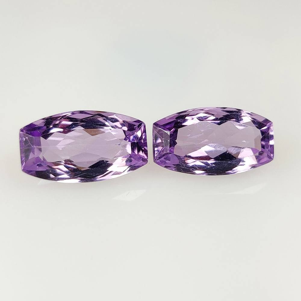 9.93 Ct Natural Purple Amethyst Fancy Cut Pair: Weight - 9.93 Ct / Dimensions - 14.80 x 8.40 x 6.00 mm / 2 Pc's / Shape - Fancy Cut / Color - Purple / Clarity - VVS / Origin -Brazil / Treatment - Heated